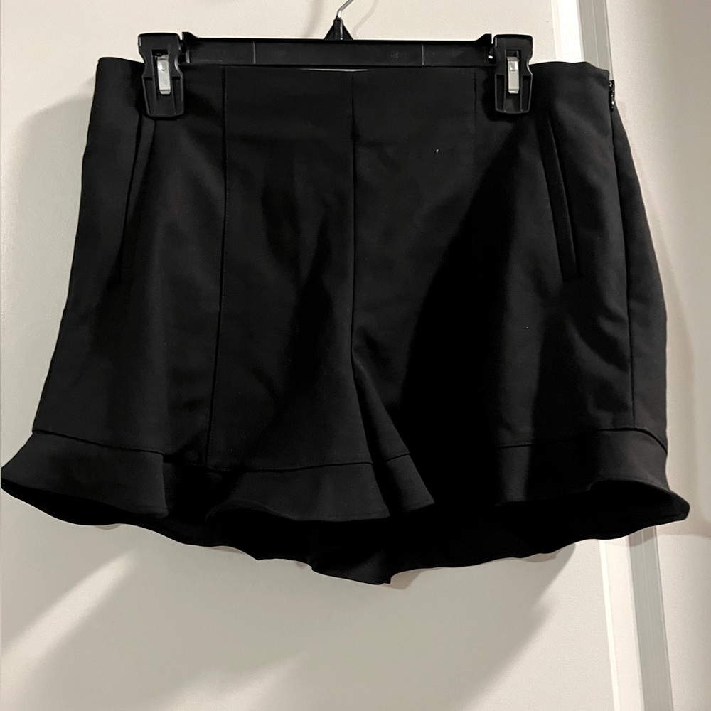 Dressy black ruffle detail black shorts. Size 10. NWT